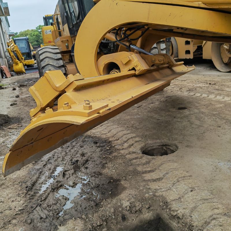 Gebruikte graafmachine land leveller Caterpillar CAT140K roader machine tweedehands Japan trekker motor in goede staat